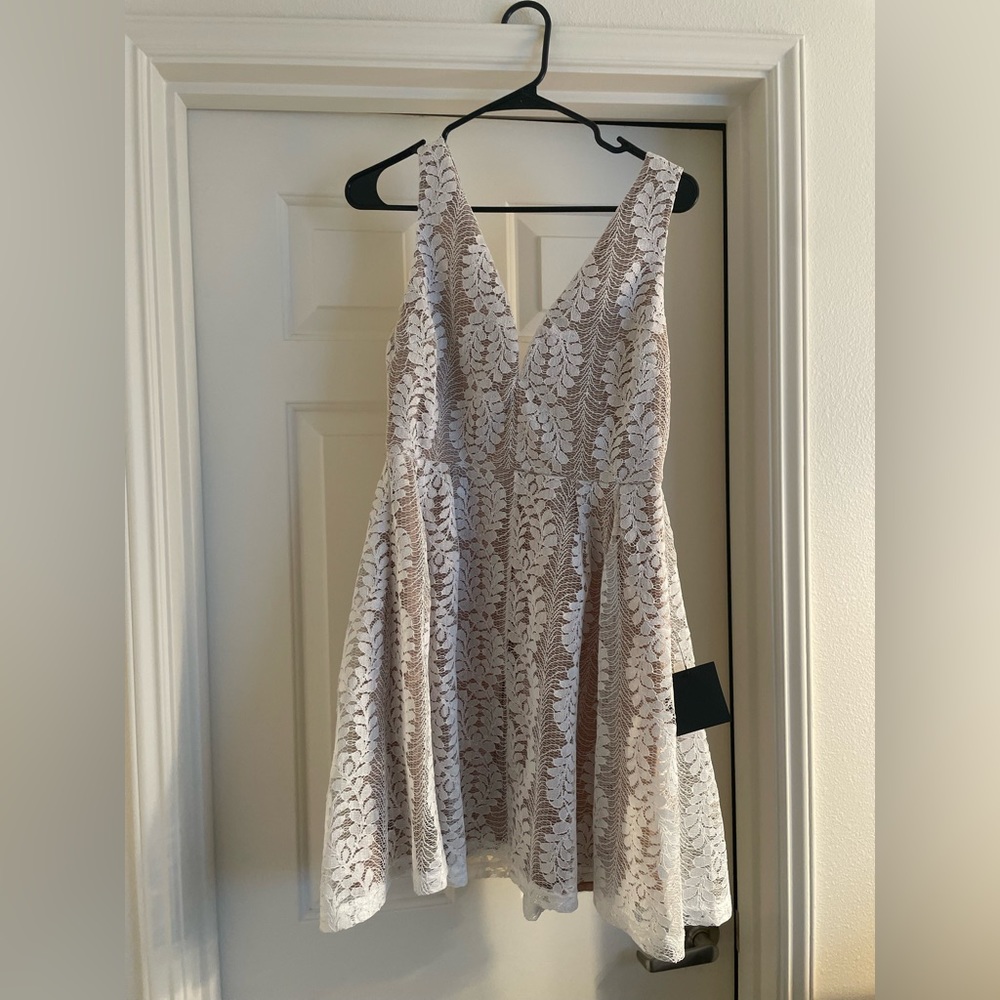 Lulu’s white lace skater dress in size Large